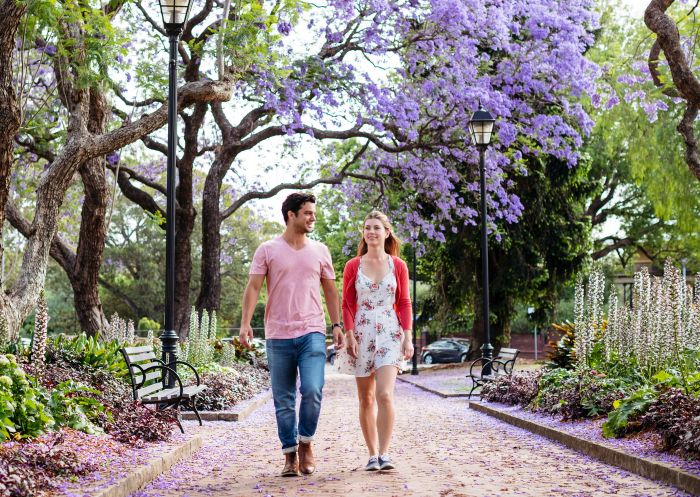 Couple enjoying walk through Prince Alfred Square, Parramatta