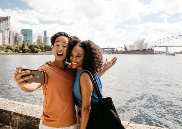 Couple taking a selfie at Mrs Macquarie's Chair, Sydney