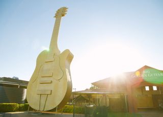 Sun shining on the 12-metre high Big Golden Guitar, Tamworth