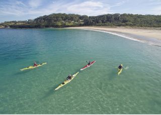 Small group enjoying a day out kayaking in Jervis Bay Kayaking, Jervis Bay