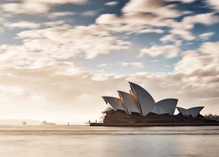 Morning sun rising over the Sydney Opera House, Sydney