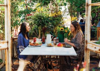 Friends enjoying breakfast at The Grounds of Alexandria, Sydney