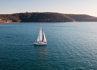 Yacht sailing through North Harbour, Sydney