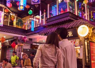 Couple enjoying Summer in Sydney at Burwood Chinatown, Burwood