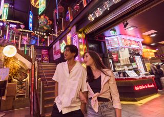 Couple enjoying Burwood Chinatown at night, Burwood
