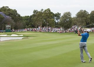 Jordan Spieth plays his approach at the Australian Open Golf 2014, Sydney