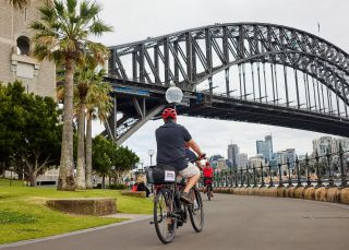 Couple enjoying bike ride with Sydney Harbour Bike Tours, The Rocks