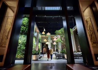 Couple walking through the foyer at Capella, Sydney