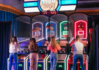 Friends playing basketball game, Archie Brothers, Alexandria - Credit: Archie Brothers