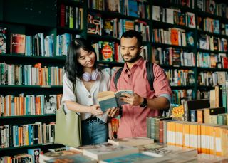 Young people browsing through the books, Elizabeth's Bookshop, Newtown