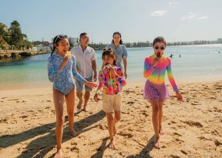 Family eating icecream at beach, Fairy Bower, Manly