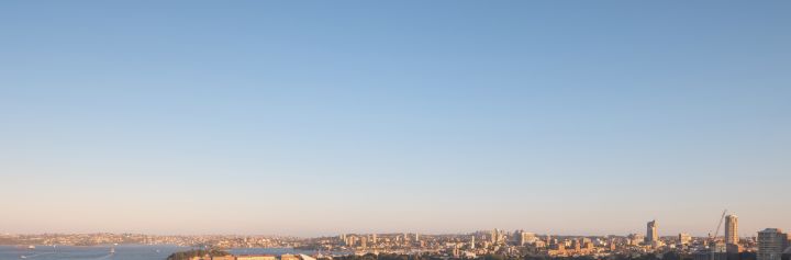 Ferries sailing past the Sydney Opera House in Sydney Harbour