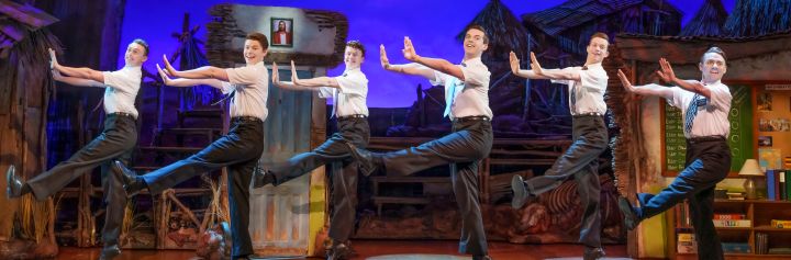 Book of Mormon cast performing on stage