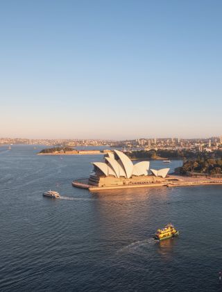 Ferries sailing past the Sydney Opera House in Sydney Harbour