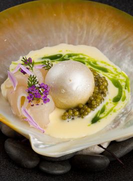 Koi Experiential’s Paspaley, with salted walnut gelato, Paspaley pearl meat, N25 Gold Oscietra caviar, creme fraiche and chive oil, Chippendale