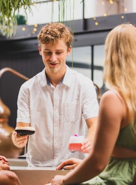 Friends enjoying cocktails, Seadrift Distillery, Brookvale