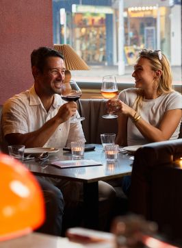 Couple drinking in the booth, Oxford House, Paddington - Credit: Steven Woodburn