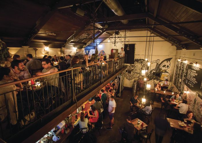  Patrons enjoying drinks and food at Mary's, in Newtown