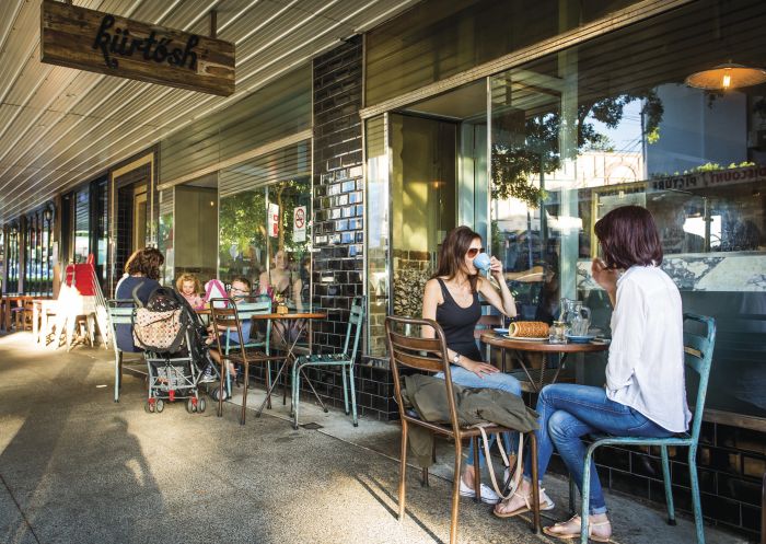 Women enjoying coffee and fresh traditional Hungarian pastries from Kürtősh, Randwick