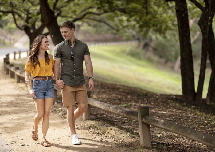Couple enjoying a walk through Parramatta Park in Parramatta, Sydney West