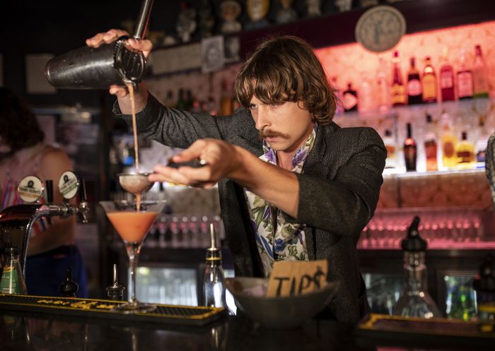 Bartender creating a cocktail at the Camelot Lounge in Marrickville,  Inner Sydney