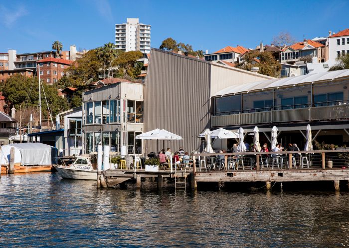 Patrons at Bayly's Restaurant enjoying waterside dining at the Ensemble Theatre, Kirribilli