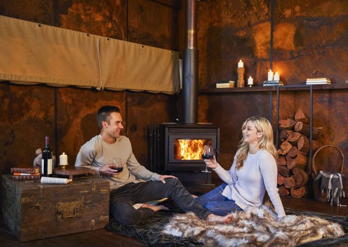 Relaxing by the fire at Spicers Sangoma Retreat in Bowen Mountain