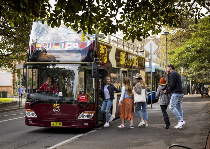 Family boarding the Big Red Bus Tours near The Rocks, Sydney