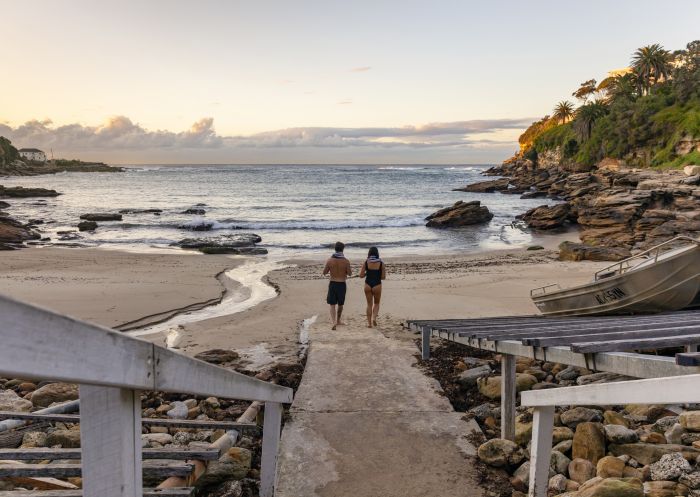 Couple enjoying a morning visit to Gordons Bay, Coogee