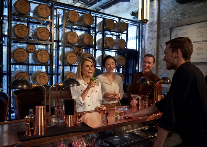 Friends at the Archie Rose Distillery Co. bar in inner city Rosebery
