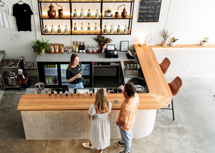 Couple enjoying a gin tasting and tour experience at Finders Distillery, St. Leonards, Sydney North