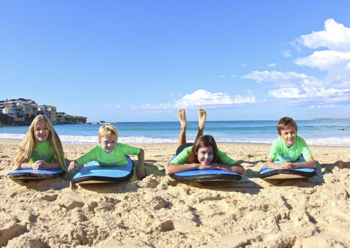  Lets Go Surfing surf school students with their surfboards on Bondi Beach, Sydney East