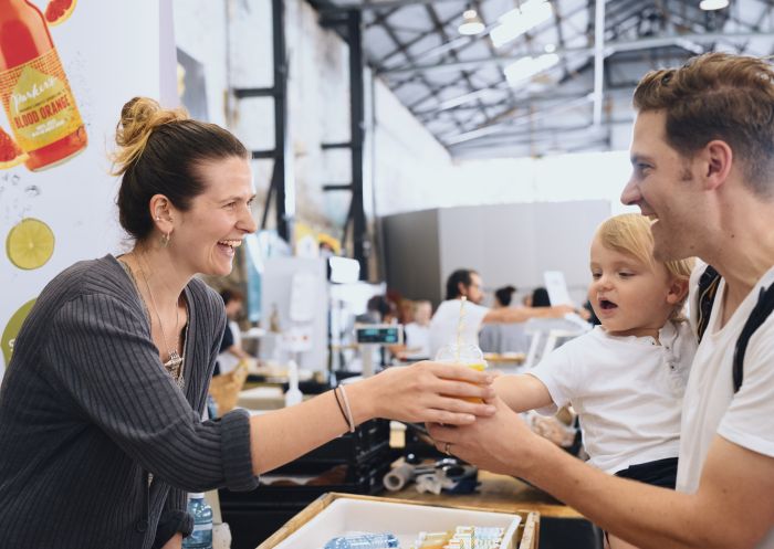 Family enjoying a visit to the Carriageworks Farmers Markets, Eveleigh