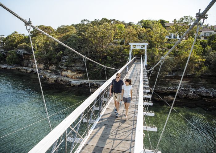 Couple enjoying a scenic walk around Parsley Bay, Vaucluse 
