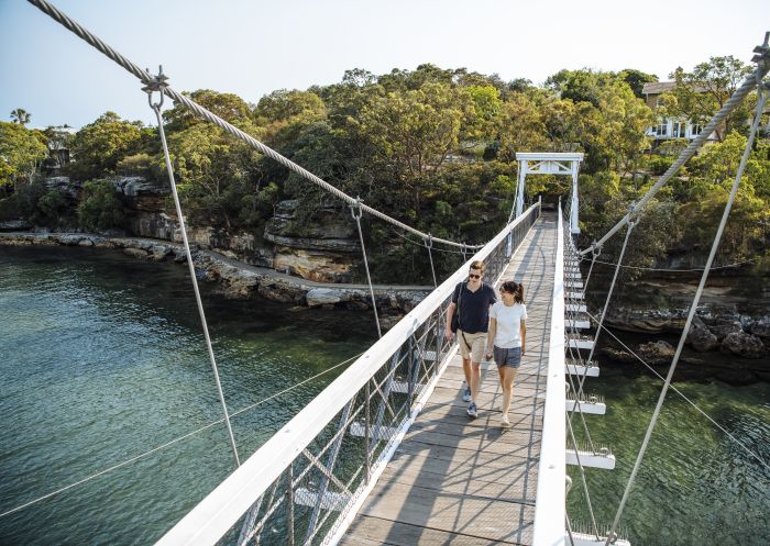 Couple enjoying a scenic walk around Parsley Bay, Vaucluse 