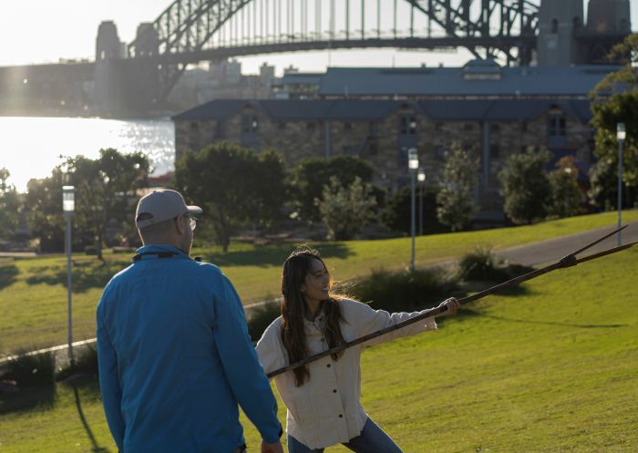 Woman learning about Aboriginal culture on a tour with Aboriginal Cultural Tours, Barangaroo Reserve 