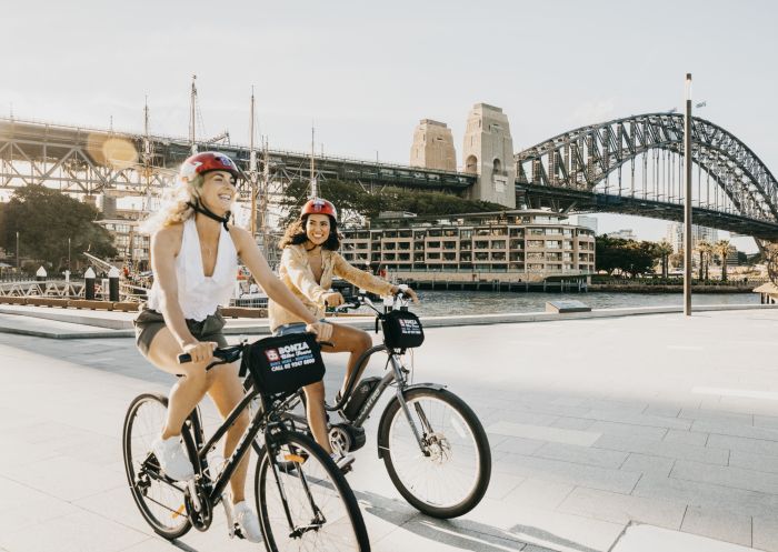 Friends enjoying a ride around Sydney Harbour with Bonza Bike Tours, The Rocks