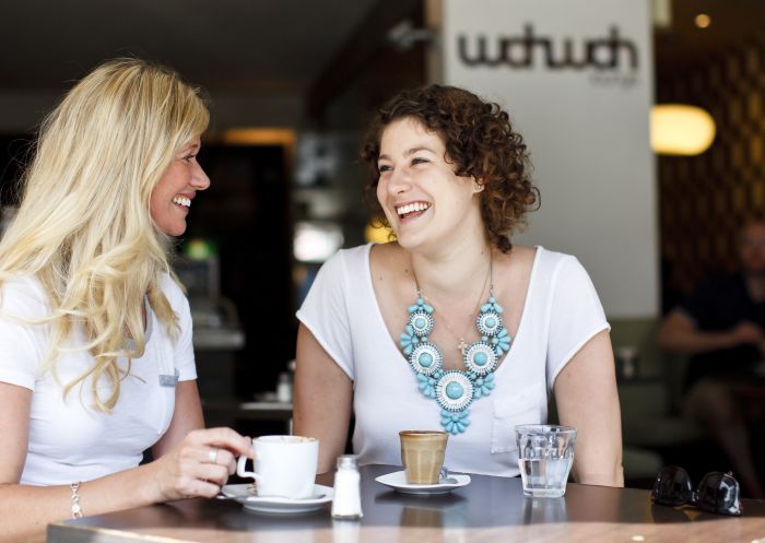 Friends having coffee at the Wah Wah Lounge, Danks Street in Waterloo