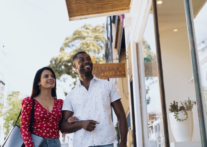 Couple enjoying a day of shopping along William Street, Paddington