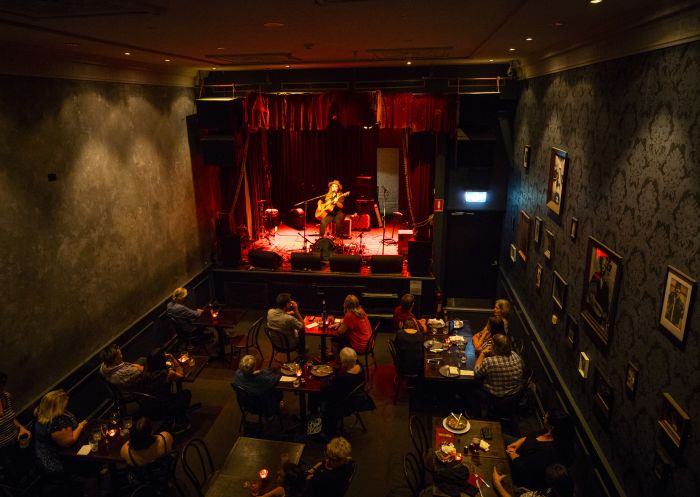 Patrons enjoying drinks and live music at The Vanguard, Newtown in Sydney's inner west.