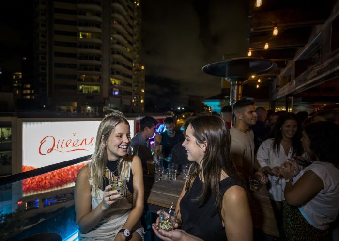 Friends having a drink at Kings Cross Hotel, Potts Point