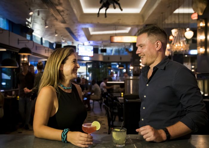 Couple enjoying a night out at Potts Point Hotel, Potts Point