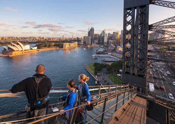 BridgeClimb Sydney Friends enjoying a twilight BridgeClimb Sydney experience overlooking Sydney Harbour