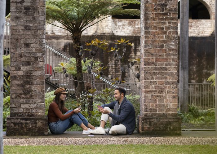 Couple relaxing in the heritage-listed award-winning Paddington Reservoir Gardens, Paddington 