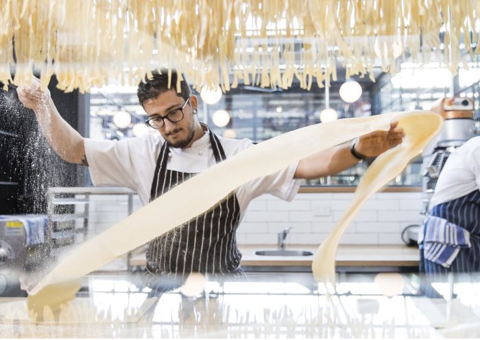 Chef making pasta at Flour Eggs Water restaurant in Tramsheds, Forest Lodge in Glebe