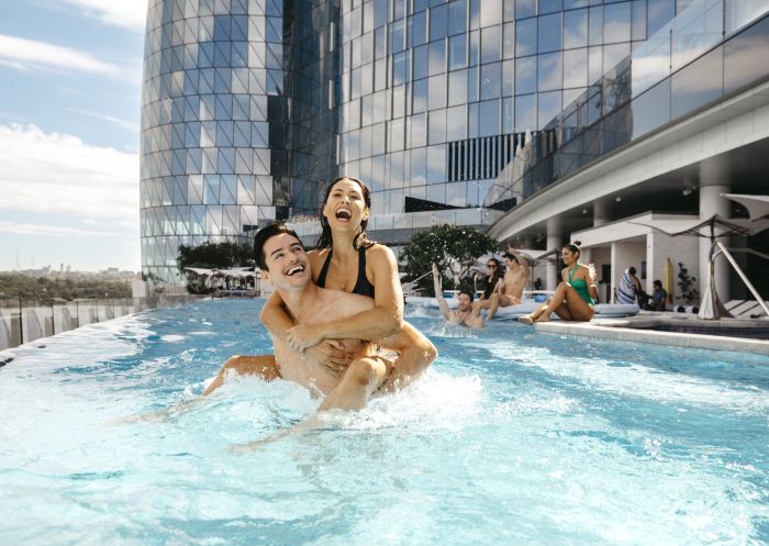 Crown Sydney, Barangaroo Couple enjoying the luxurious pool at Crown Towers hotel, Crown Sydney, Barangaroo