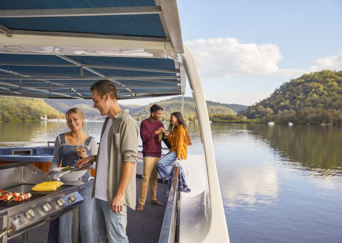 Friends enjoying a stay on an Able Hawkesbury River Houseboats vessel in Wisemans Ferry