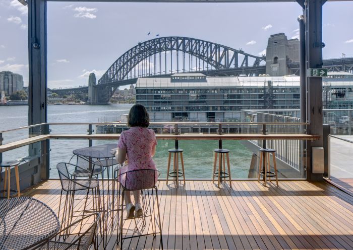 Woman enjoying view from Bar at Sydney Theatre Company in Walsh Bay, Sydney City