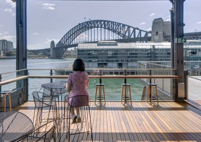 Woman enjoying view from Bar at Sydney Theatre Company in Walsh Bay, Sydney City