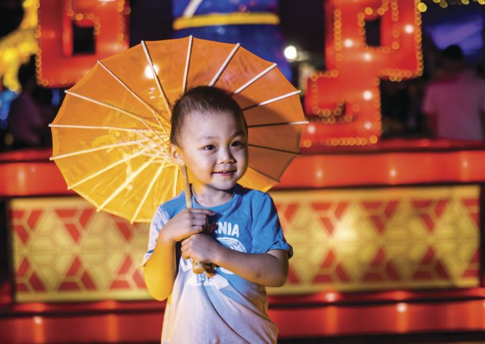 A young boy enjoying a night out at the Chinese New Year Lantern Festival 2018, Tumbalong Park, Darling Harbour.